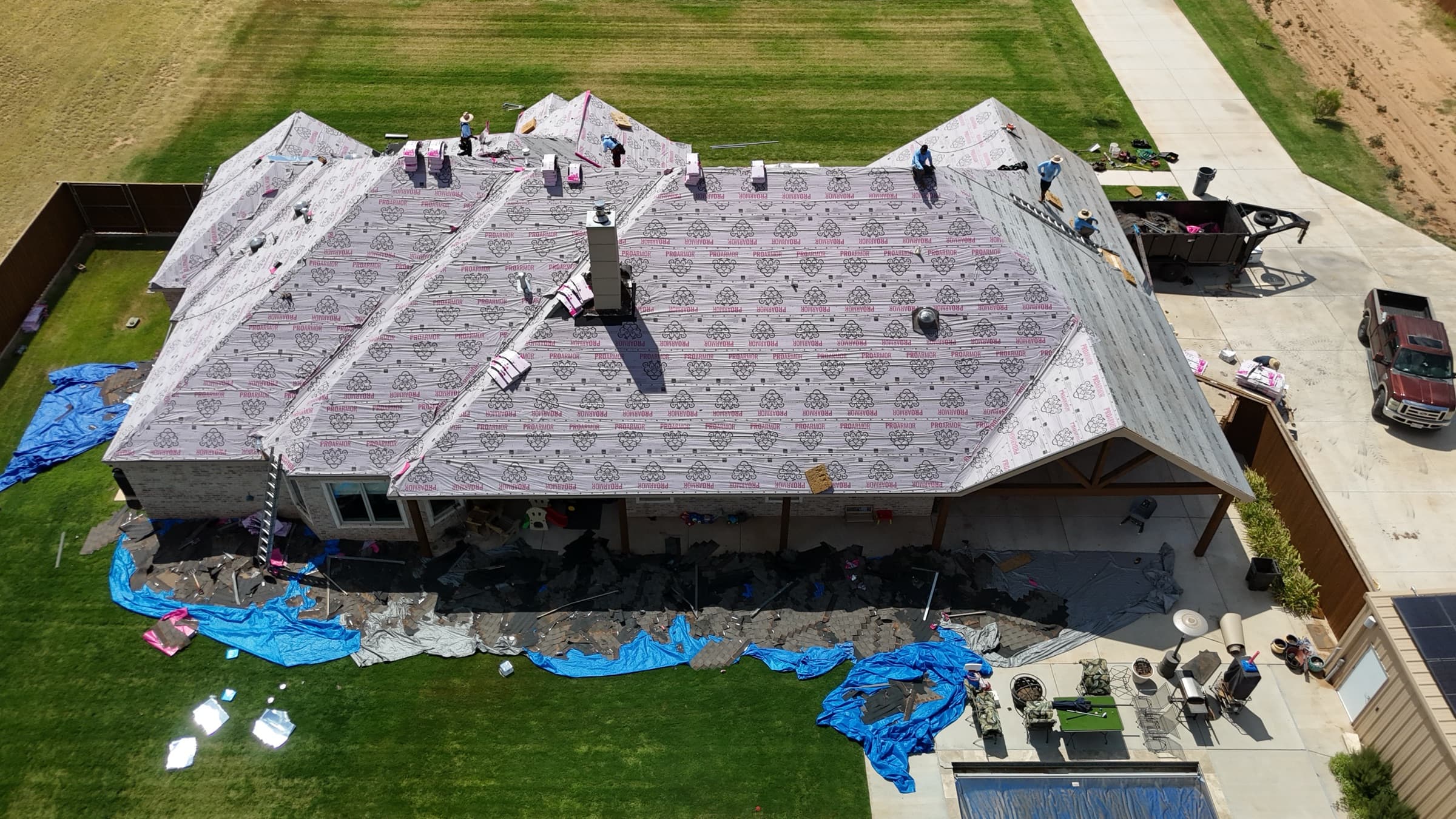 Roof replacement in progress — OC ProArmor underlayment installation